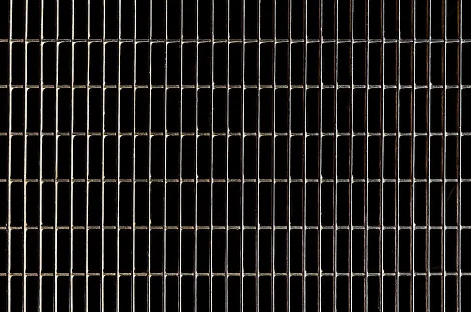 High-resolution photo of a grid-like steel texture with a geometric pattern.